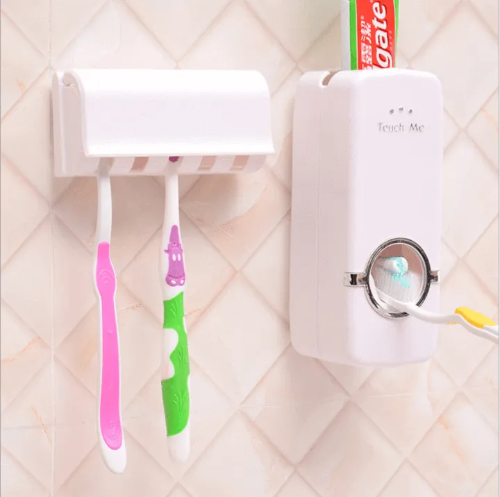 TOOTHPASTE DISPENSER WITH TOOTHBRUSH HOLDER