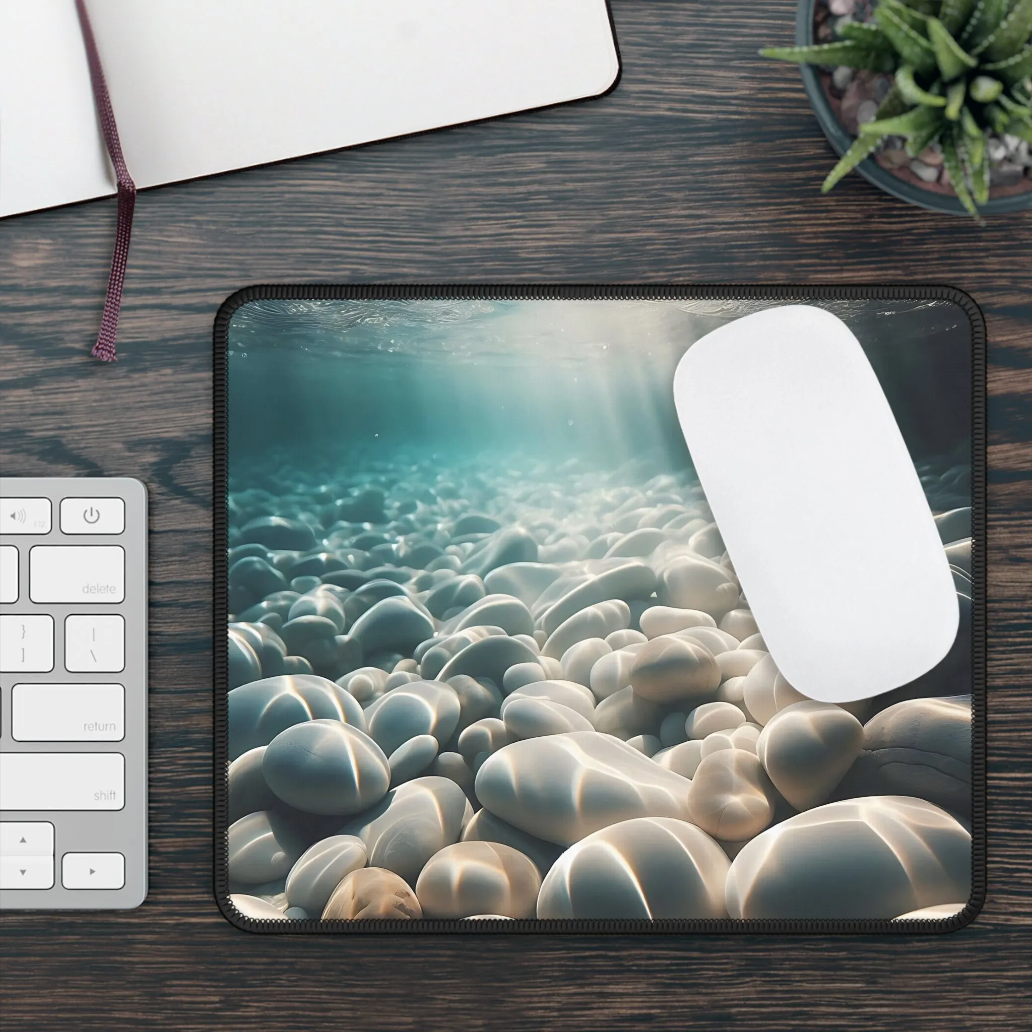 White pebbles in a crystal clear sea Gaming Mouse Pad