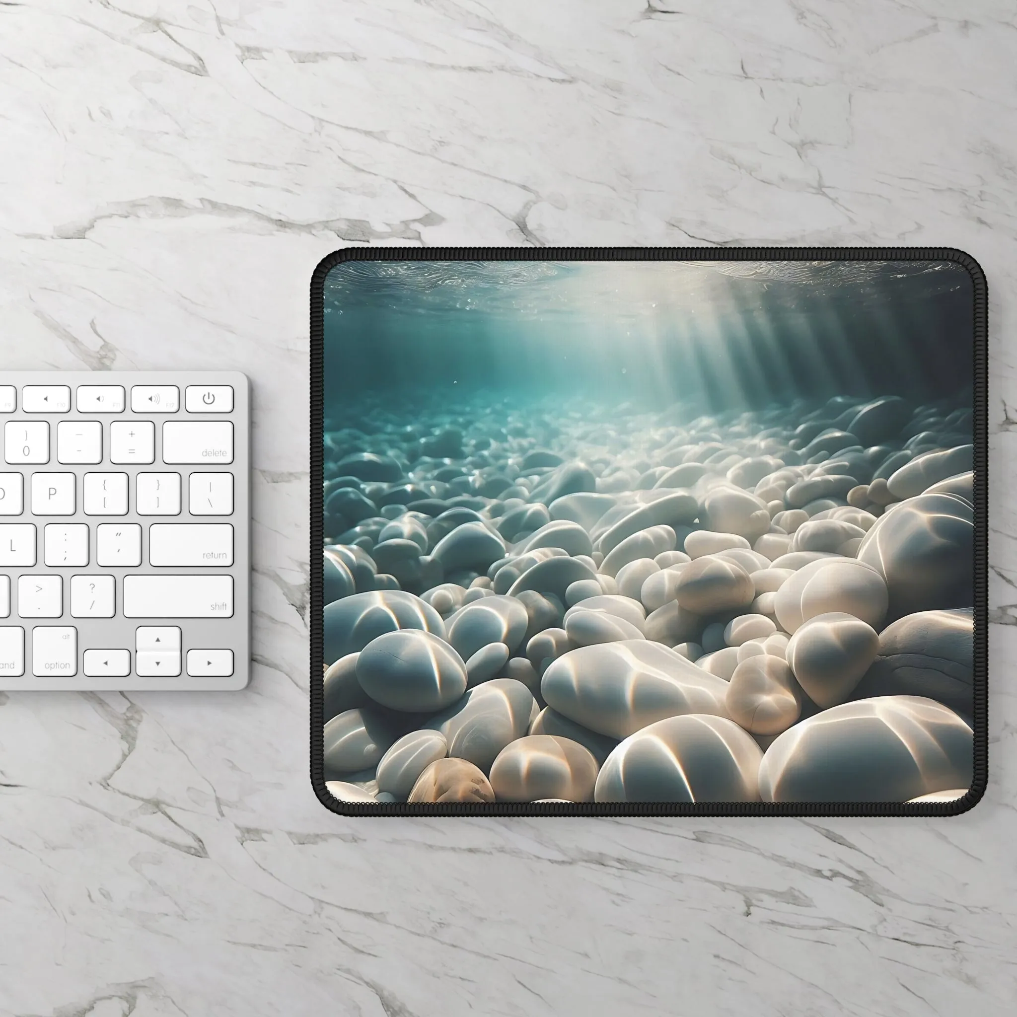 White pebbles in a crystal clear sea Gaming Mouse Pad